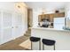 Neat kitchen with stainless steel appliances and wood cabinets at 4012 Santa Maria # 101, Kissimmee, FL 34741
