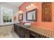 Double vanity bathroom with modern sinks and tile flooring at 416 Arbor Cir, Celebration, FL 34747