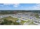 Aerial view showing home location in new community with pool and playground at 445 Madison Dr, Davenport, FL 33837