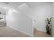 Modern staircase leading upstairs with a simple design at 445 Madison Dr, Davenport, FL 33837
