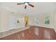 Hardwood floor living room with high ceilings and lots of light at 537 Campus St, Celebration, FL 34747