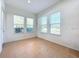 Sunlit breakfast nook with tile flooring and window views at 6818 Trellis Vine Loop, Windermere, FL 34786