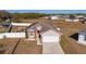 Single-Gathering home with a fenced backyard and driveway at 825 Desmoines Pl, Kissimmee, FL 34759