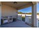 Covered back patio with a generator and storage at 825 Desmoines Pl, Kissimmee, FL 34759