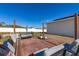 Backyard patio with seating area and pergola at 825 Desmoines Pl, Kissimmee, FL 34759