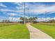 Pathway to baseball field with dugout at 825 Desmoines Pl, Kissimmee, FL 34759