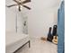 Bedroom with king-size bed, ceiling fan, and guitar at 825 Desmoines Pl, Kissimmee, FL 34759