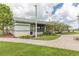 Community building with green roof and ample windows at 825 Desmoines Pl, Kissimmee, FL 34759
