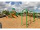 playground with swings and climbing structures at 825 Desmoines Pl, Kissimmee, FL 34759