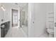 Modern bathroom with walk-in shower, toilet, and vanity at 8664 Dubochet St, Orlando, FL 32827
