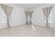 Bright bedroom with wood-look floors and neutral walls at 8664 Dubochet St, Orlando, FL 32827
