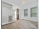 Large bedroom with walk-in closet and chandelier at 8664 Dubochet St, Orlando, FL 32827
