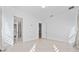 Spacious bedroom with wood-look floors and access to bathroom at 8664 Dubochet St, Orlando, FL 32827