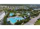 Aerial view of community pool, including lap pool and leisure pool at 8664 Dubochet St, Orlando, FL 32827