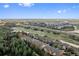 Aerial view of townhouses near golf course at 879 Assembly Ct, Reunion, FL 34747