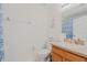 Well-appointed bathroom with shower and vanity at 879 Assembly Ct, Reunion, FL 34747