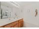 Double vanity bathroom with soaking tub at 879 Assembly Ct, Reunion, FL 34747