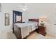 Bedroom with full-size bed and dresser at 879 Assembly Ct, Reunion, FL 34747