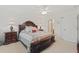 Large bedroom with king-size bed and access to bathroom at 879 Assembly Ct, Reunion, FL 34747