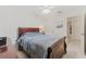 Bedroom with full-size bed and ensuite access at 879 Assembly Ct, Reunion, FL 34747