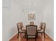 Formal dining room with wood table and six chairs at 879 Assembly Ct, Reunion, FL 34747