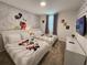 Mickey Mouse themed bedroom with two twin beds at 977 Splash Shot Pl # 1, Davenport, FL 33896