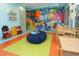 Colorful ' playroom with toys and a TV at 977 Splash Shot Pl # 1, Davenport, FL 33896