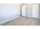 Bedroom with gray walls, wood flooring, and a large closet at 101 Gerry Dr, Altamonte Springs, FL 32714