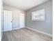 Bright bedroom with new flooring and neutral walls at 101 Gerry Dr, Altamonte Springs, FL 32714