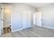 Bedroom with gray walls, wood-look floors, and en-suite bathroom at 101 Gerry Dr, Altamonte Springs, FL 32714
