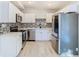 Modern kitchen with stainless steel appliances and patterned backsplash at 101 Gerry Dr, Altamonte Springs, FL 32714