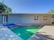 Inviting kidney-shaped pool with a hot tub at 101 Gerry Dr, Altamonte Springs, FL 32714