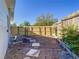 Unlandscaped side yard with a wooden fence at 101 Gerry Dr, Altamonte Springs, FL 32714