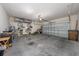 Garage with overhead storage and ample space at 1687 Park Side Ave, Kissimmee, FL 34744