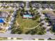Aerial view of community with pool and clubhouse at 1721 Sunfish St, St Cloud, FL 34771