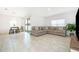 Spacious living room with a large sectional sofa at 1721 Sunfish St, St Cloud, FL 34771