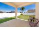 Covered patio with backyard view and seating area at 1721 Sunfish St, St Cloud, FL 34771