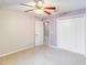 Spacious bedroom with neutral walls and ceiling fan at 1960 Jan Lan Blvd, St Cloud, FL 34772