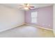 Spacious bedroom with neutral walls, carpeted floor, and ceiling fan at 1960 Jan Lan Blvd, St Cloud, FL 34772