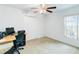 Bedroom with carpeted floor, ceiling fan, and built-in closet at 1960 Jan Lan Blvd, St Cloud, FL 34772