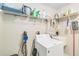 Laundry room with washer, dryer, and ample shelving at 1960 Jan Lan Blvd, St Cloud, FL 34772
