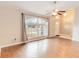 Spacious living area featuring hardwood floors and a big window at 1960 Jan Lan Blvd, St Cloud, FL 34772