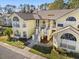 Aerial view of a yellow residential building at 2033 Royal Bay Blvd # 49, Kissimmee, FL 34746