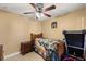 Bedroom with a twin bed, nightstand and treadmill at 2033 Royal Bay Blvd # 49, Kissimmee, FL 34746