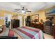 Main bedroom with a comfortable bed, dresser, and flat-screen TV at 2033 Royal Bay Blvd # 49, Kissimmee, FL 34746