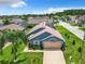 This single-Gathering home features a solar panel system and a spacious yard at 204 Fox Loop, Davenport, FL 33837
