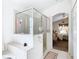 Bathroom with shower, tub, and vanity at 204 Fox Loop, Davenport, FL 33837