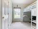 Bedroom with a loft bed and built-in desk at 204 Fox Loop, Davenport, FL 33837