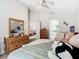 Spacious bedroom with king-size bed and dresser at 204 Fox Loop, Davenport, FL 33837