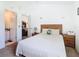 Bedroom with a double bed and en-suite bathroom at 204 Fox Loop, Davenport, FL 33837